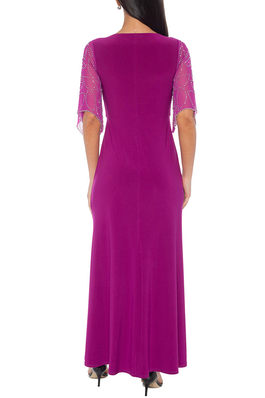 Marina Deep V-Neckline Beaded Sleeves Maxi Silhouette Dress | Available at Immediate Apparel Curated Brands Marina Deep V-Neckline Beaded Sleeves Maxi Silhouette Dress | Available at Immediate Apparel Curated Brands