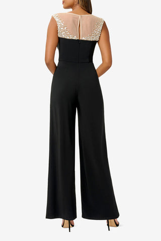 AP1E210144 BLACK back Adrianna Papell jersey jumpsuit with cap sleeves, wide-leg pants, and bateau neck